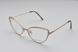 frame glasses xavier garcia women titanium frame white and rose gold color cat eye shape titanium frame