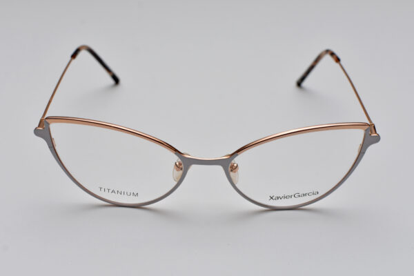 frame glasses xavier garcia women titanium frame white and rose gold color cat eye shape titanium frame